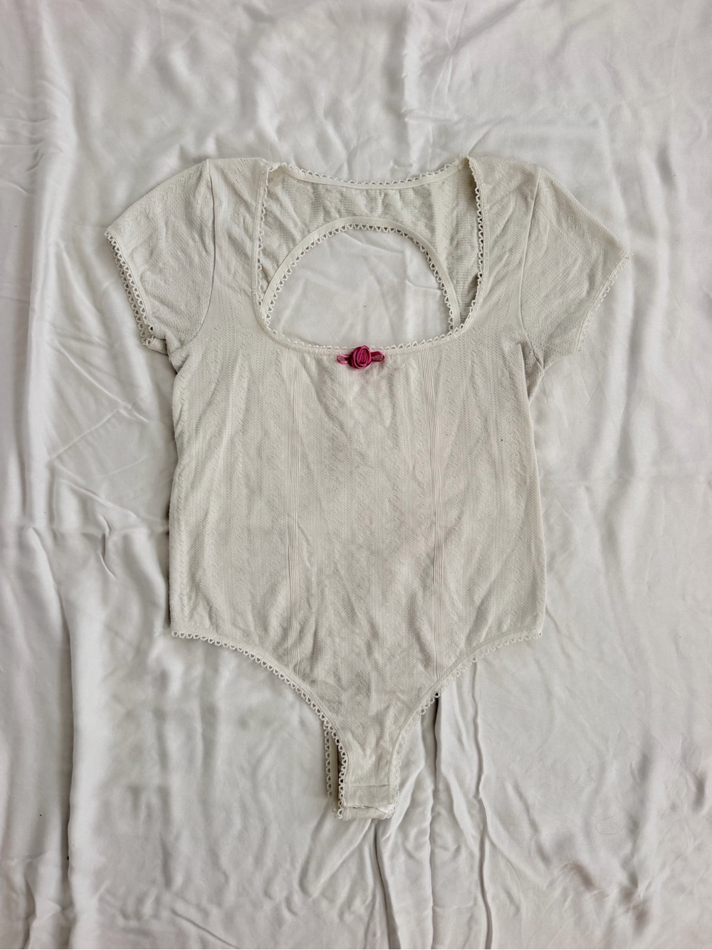Anthropologie Cream One-Piece Bodysuit with Pink Rose Accent